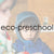 A young boy in a blue rain suit with the words eco-preschool overlayed